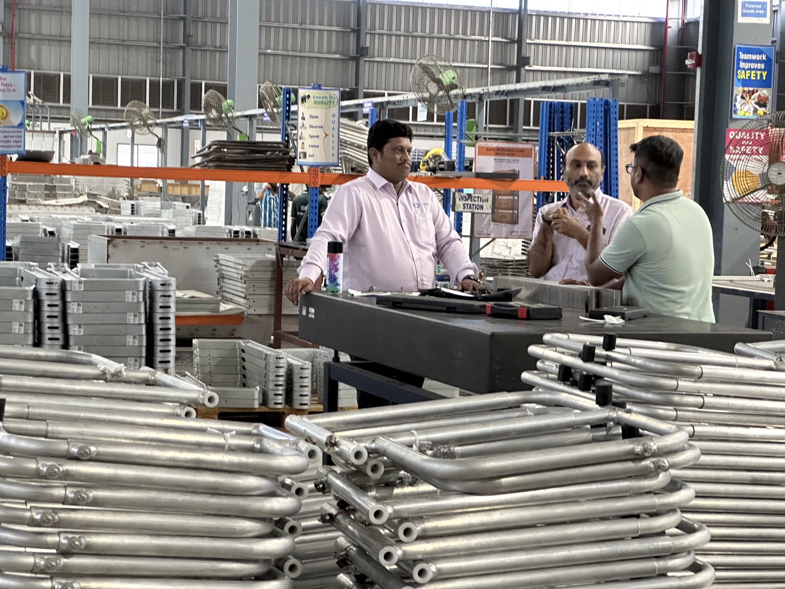 SVIN Tech leadership at the production facility in India